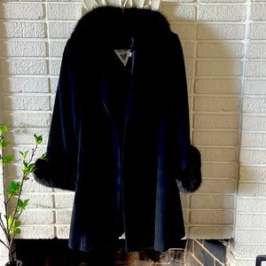 Lambs wool coat with fur accents